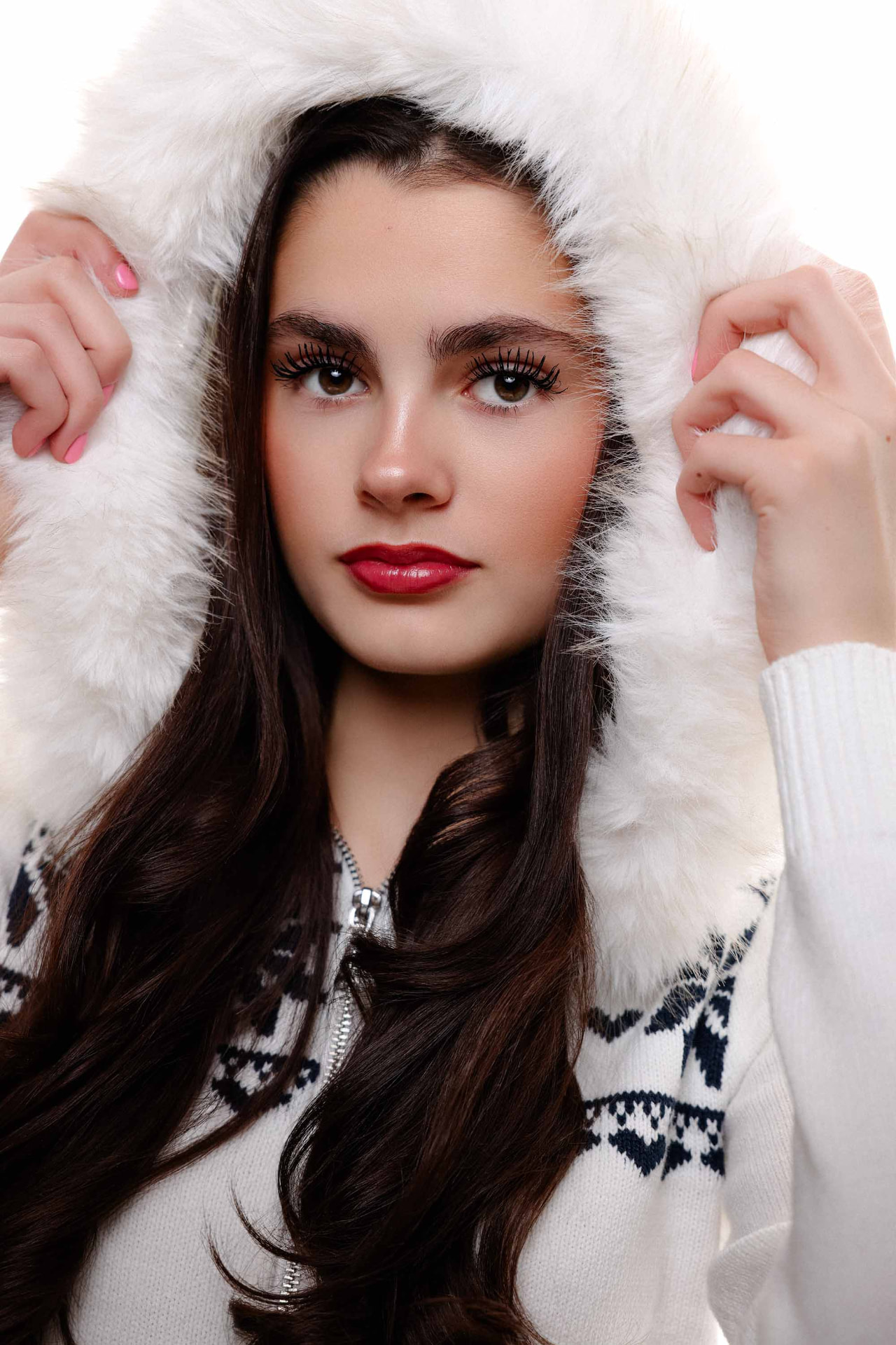 Ellie Gray in a white fur-trimmed winter hood